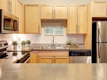 Granite-Inspired Counter Tops, at Newberry Square Apartments, WA, 98087